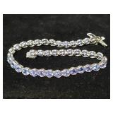 14 Kt white gold and purple stone bracelet, 7"