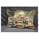 Mid-century beveled mirror with gilt carved