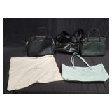 Group of designer style handbags marked Kate Spade