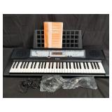 Yamaha keyboard PSR-E213 with Road Runner case