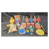 Large group of vintage ping pong paddles and
