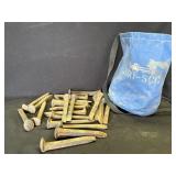 22 antique iron railroad spikes in bag