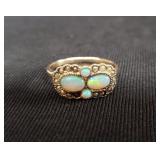 14k gold ring with opal stones