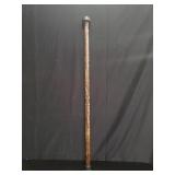 Wood cane with mother of pearl inlay