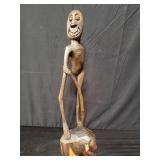 Carved wood sculpture, 5 1/2"l. x 4"w. x 21"h.