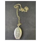 Vintage silver locket with metal chain