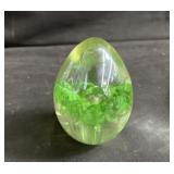 Signed art glass egg shaped paperweight with