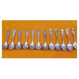 Group of savounier silver plated spoons .Flagship