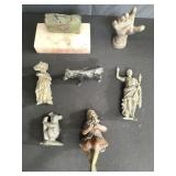 Group of brass and pewter figurines, metal hand