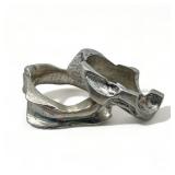 Pair of signed silver brutalist rings, 15.46g