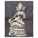 Asian brass deity, 4" l. x 3" w. x 6 1/2" h.