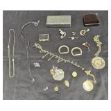 Group of vintage jewelry, pins, pendants,