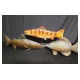 Box of decorative fish figurines