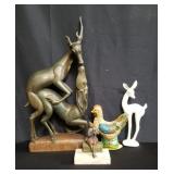 Box of carved wood, brass, and composite figurines