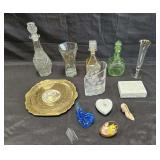 Group of vintage decanters and porcelain plate