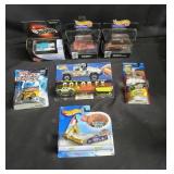 Group of Hot Wheels cars in boxes