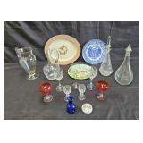 Group of vintage porcelain and glass decanters