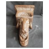 Vintage Regency-style rams-head plaster wall