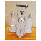 Vintage Silver plated cruet with wooden handle.