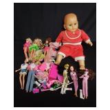 Box of dolls with accessories
