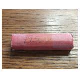 Roll of 1950-S Lincoln Wheat Cent coins. In case