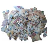 Huge collection of thousands of stamps. In bag.