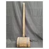 Vintage handmade wood and iron mallet