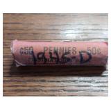 Roll of 1945-D Lincoln Wheat Cent coins. In case