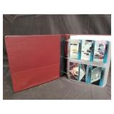 Movie scene trading cards in binder