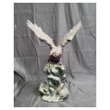 Cast iron bird sculpture