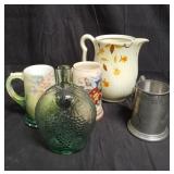 Group of mugs, ceramic pitcher, glass decanter,