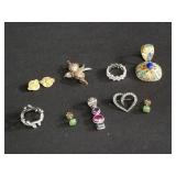 Group of sterling silver pins, brooches, rings