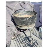 Large cast iron cauldron with stand