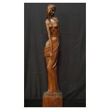 Carved wood nude sculpture