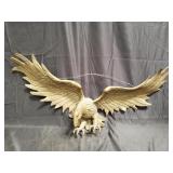 Hanging brass eagle