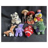Group of ceramic dolls & stuffed animals in box