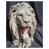 Plaster lion head garden statue