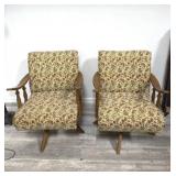 Vintage rocking swivel arm chairs