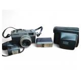 Vintage Canon Canonet 28 film camera, flash, and