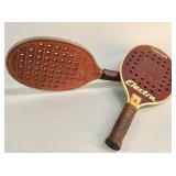 Two wood, metal, and leather paddle tennis