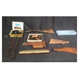 Group of assorted gun stocks and parts