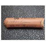 Roll of 1943 Lincoln Wheat Steel Cent coins. In