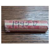 Roll of 1945-D Lincoln Wheat Cent coins. In case