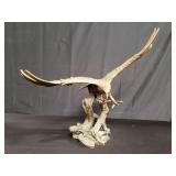 Copper colored composite eagle statue