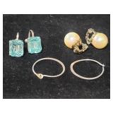 3 pairs of sterling silver earrings, one with
