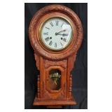 Carved wood regulator clock