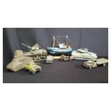 Box of toy tanks and ships