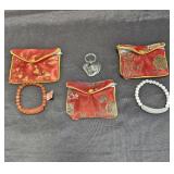 Group of two carved jade bracelets with 3 - silk