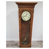 Vintage Howard Miller grandfather clock . Model #