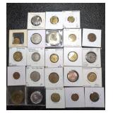 Coins, medals, and tokens in holders. Dated from